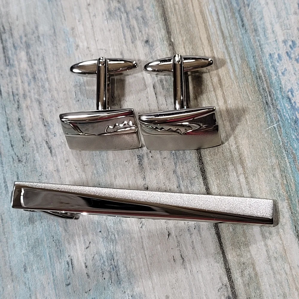 Cuff Links and Tie clip.